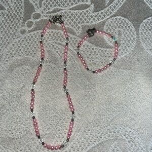 Girl’s beautiful handmade pink necklace and bracelet set.